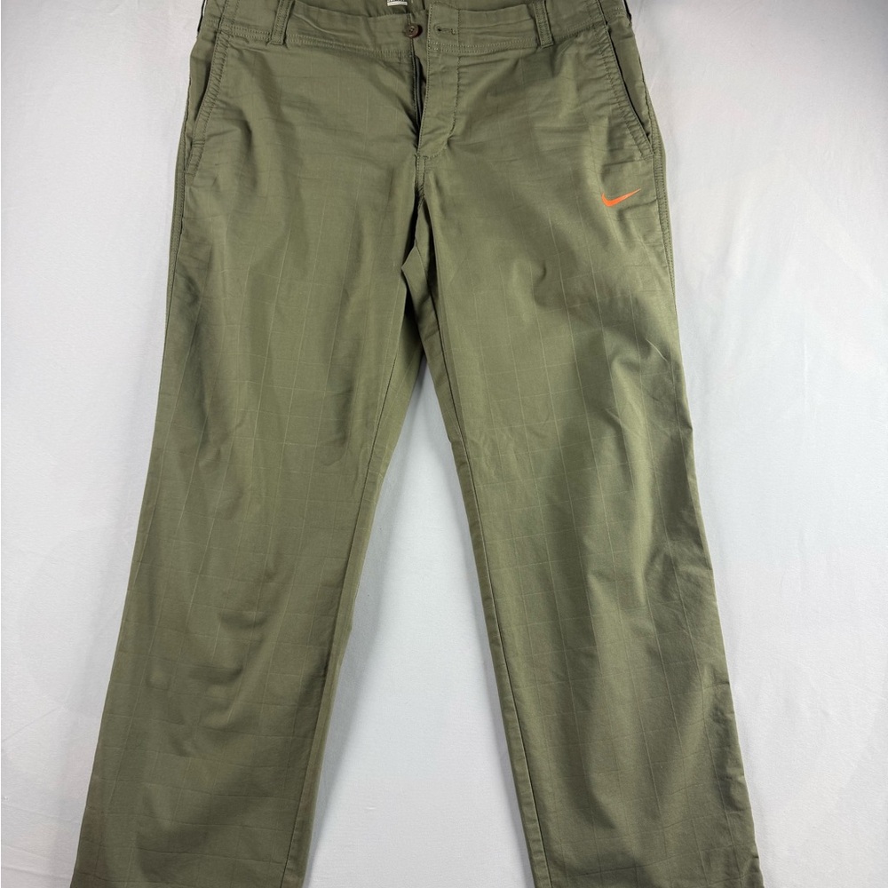 Nike Men's Olive Green Chino Pants with Orange Swoosh